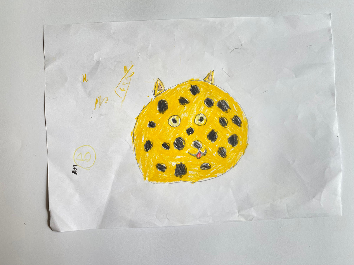 Raw parent photo of a child drawing